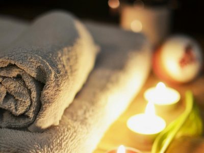 Spa ambiance with towels and candles