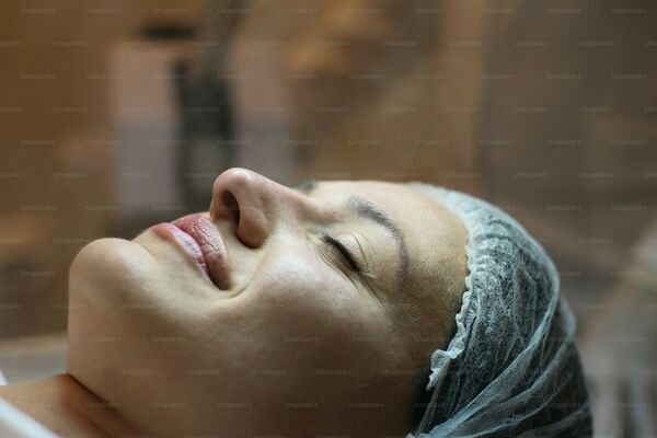 Day spa beauty treatment with professional facial service in progress
