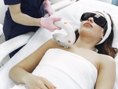 IPL laser facial treatment with protective eyewear