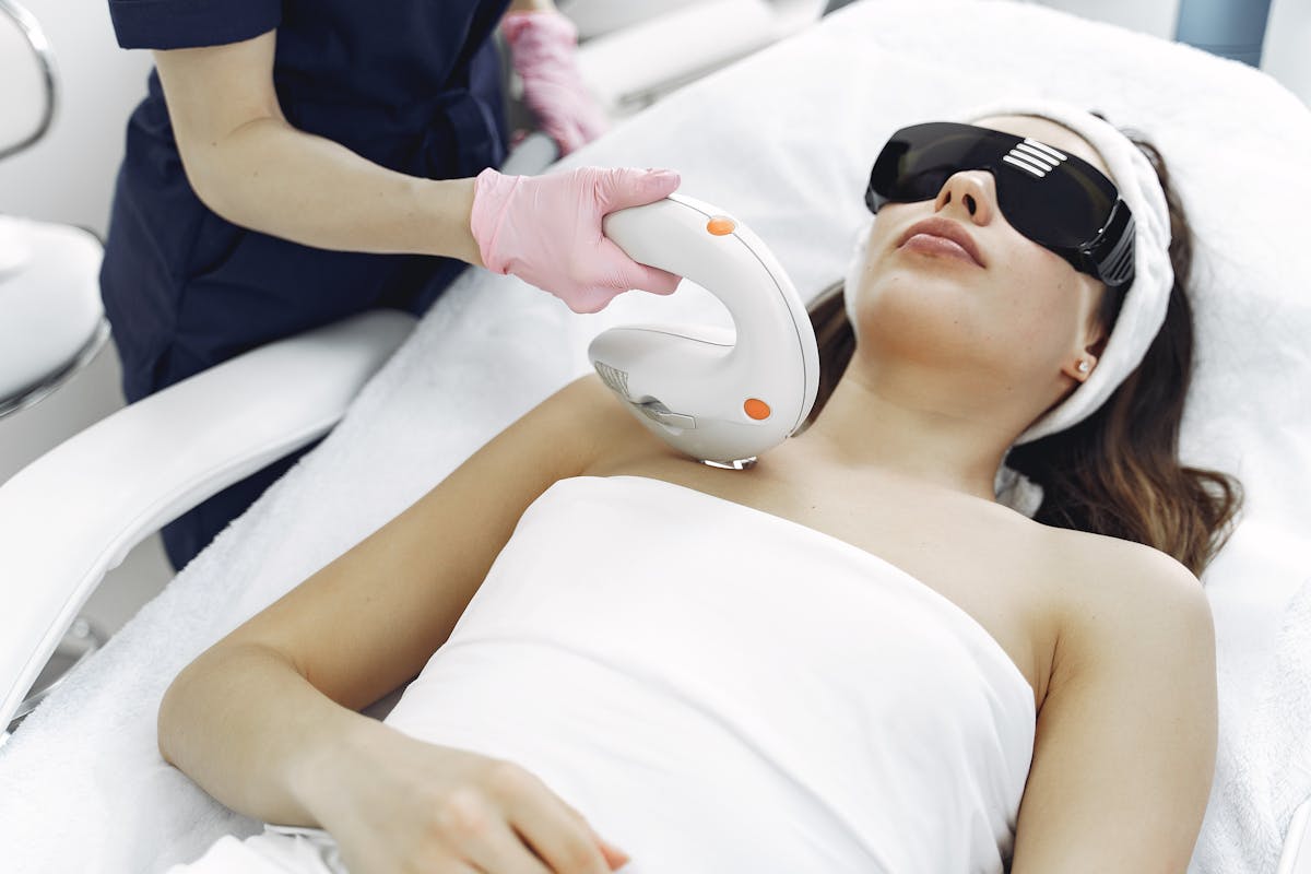 IPL laser facial treatment with protective eyewear