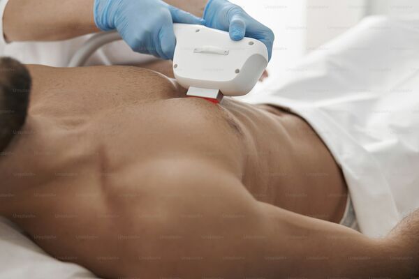 Professional laser hair removal on leg with cooling