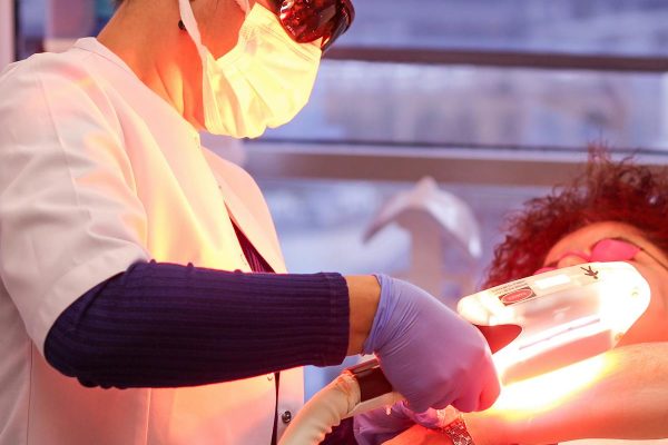 Laser hair removal treatment with safety goggles