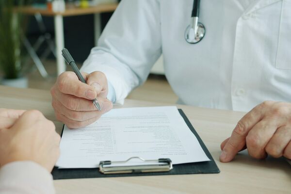 Patient reviewing medspa preparation checklist during consultation